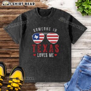 Champion washed t-shirt with 'Someone in Texas loves me' design, perfect for casual wear and Texas pride.