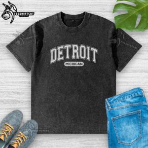 Premium Detroit Michigan area code washed t-shirt in a casual setting, showcasing its soft fabric and unique design.