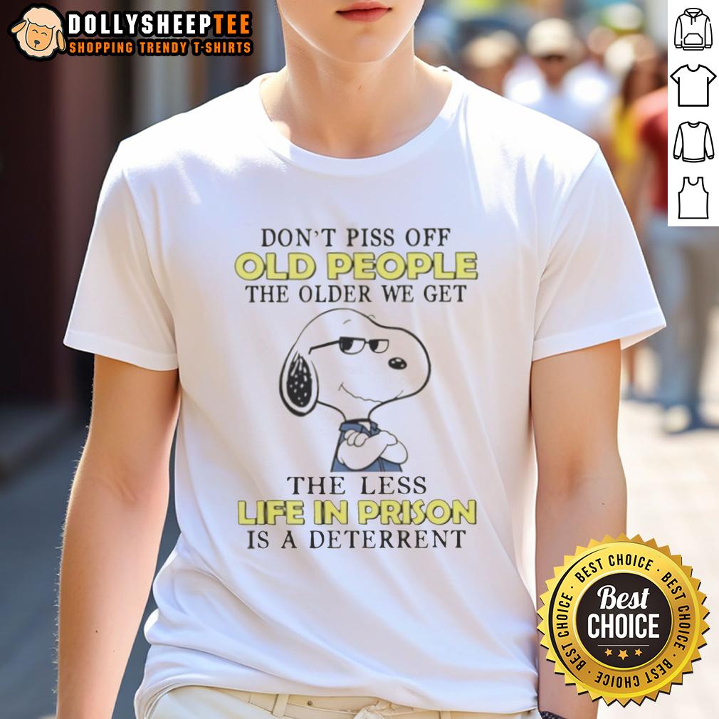 Cute Snoopy Don't Piss Off Old People The Older We Get The Less Life In Prison Is A Deterrent T-Shirt Alt Text: Cute Snoopy graphic on a t-shirt with text Don't Piss Off Old People highlighting humor about aging and life in prison.