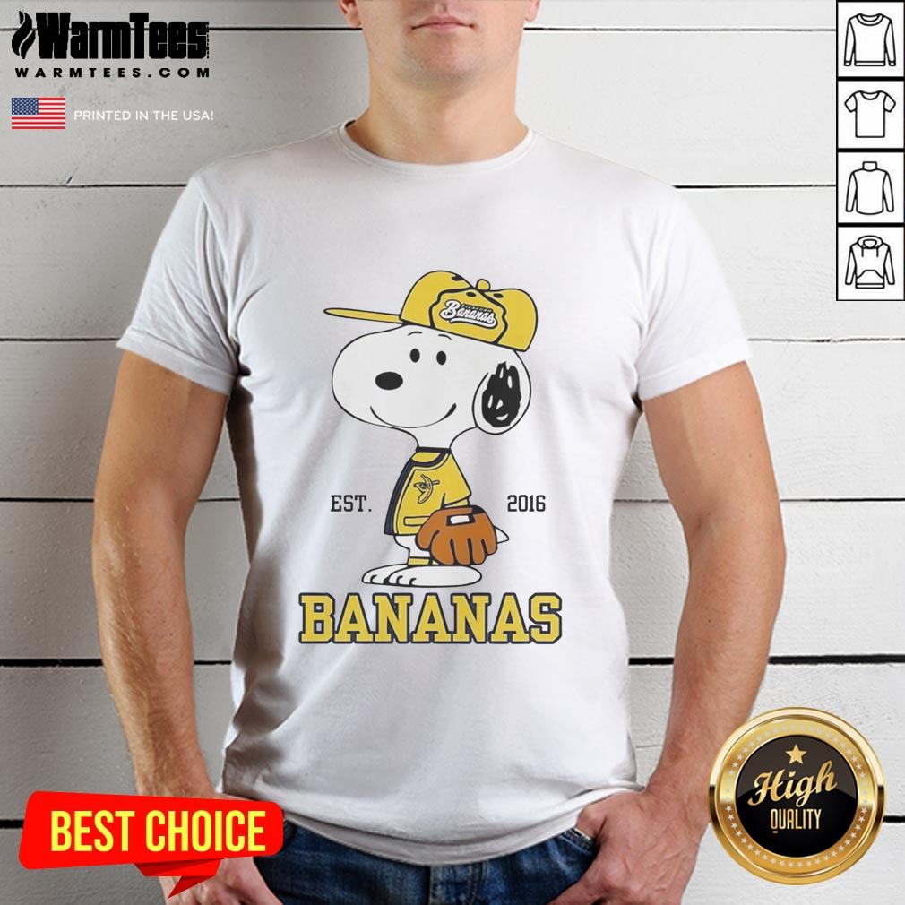 cute-snoopy-wearing-savannah-bananas-outfit-est-2016-t-shirt-1 Alt Text: Cute Snoopy wearing a Savannah Bananas outfit with Est 2016 on a trendy t-shirt, perfect for fans and collectors.