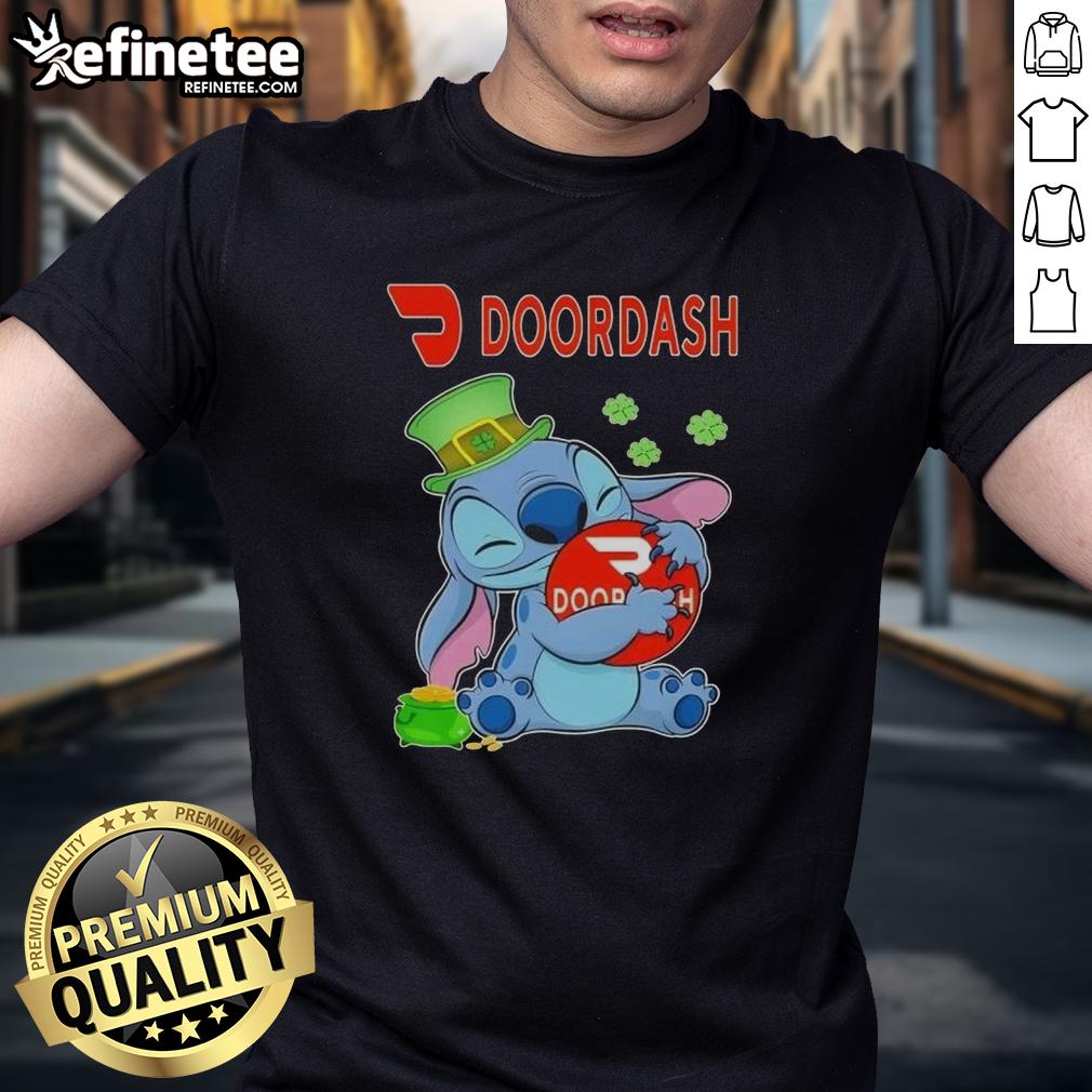 cute-stitch-hug-doordash-logo-st-patricks-day-t-shirt-1 Alt Text: Cute Stitch hugging Doordash logo on a St. Patrick's Day t-shirt, perfect festive apparel for food delivery fans.
