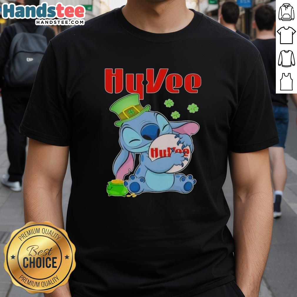 cute-stitch-hug-hyvee-logo-st-patricks-day-t-shirt-1 Alt Text: Cute Stitch Hug St. Patrick's Day T-shirt featuring Hy-Vee logo, perfect for festive celebrations and casual wear.