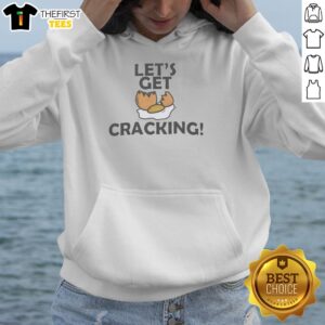 Top Let's Get Cracking Egg Graphic Hoodie featuring a playful egg design, perfect for casual wear and egg lovers.