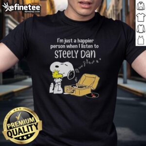 Alt Text: Original Snoopy 'I'M Just A Happier Person When I Listen To Steely Dan' T-Shirt featuring classic cartoon design.