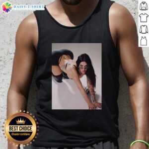 Megan Fox poses in a timeless tank top for a stunning new Instagram photo, showcasing her iconic style and beauty.