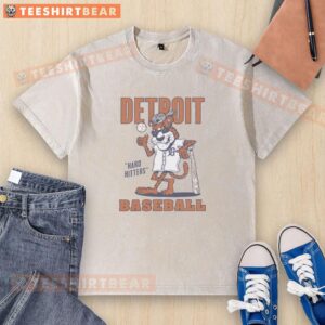Good Hard Hitters Detroit Baseball mascot on a washed t-shirt, showcasing team spirit and style for fans.