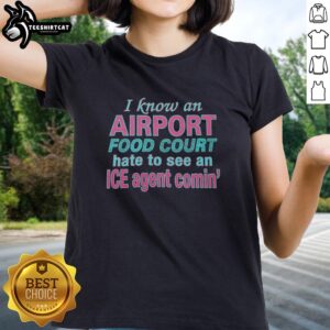 Premium 'I Know An Airport Food Court' Ladies Tee featuring a humorous ice agent graphic, perfect for travel lovers.