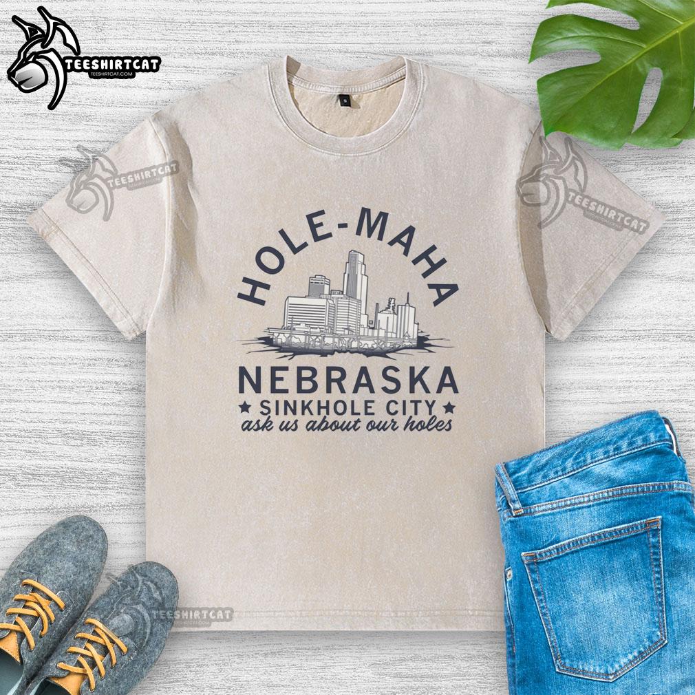 funny-hole-maha-nebraska-sinkhole-city-ask-us-about-our-holes-washed-t-shirt Funny Hole Maha Nebraska Sinkhole City t-shirt featuring humorous design and slogan 'Ask Us About Our Holes.'