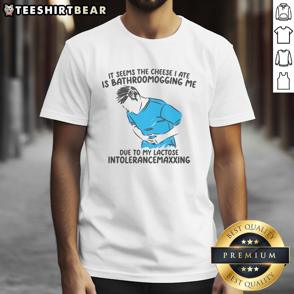 funny-it-seems-the-cheese-i-ate-is-bathroomogging-me-t-shirt-1 Alt Text: Funny It Seems The Cheese I Ate Is Bathroomogging Me T-Shirt featuring humorous cheese graphic and playful text.