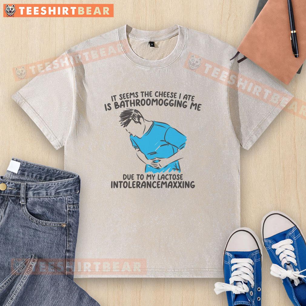 funny-it-seems-the-cheese-i-ate-is-bathroomogging-me-washed-t-shirt Funny T-shirt design: 'The cheese I ate is bathroomogging me' with playful graphics and humorous text for cheese lovers.