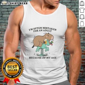 Capybara tank top design featuring a cute capybara with text about being mistaken for an adult due to age.
