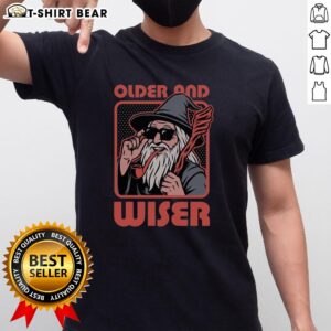 Colorful pop art illustration of a nice old wise wizard on a T-shirt, perfect for fantasy and magic enthusiasts.