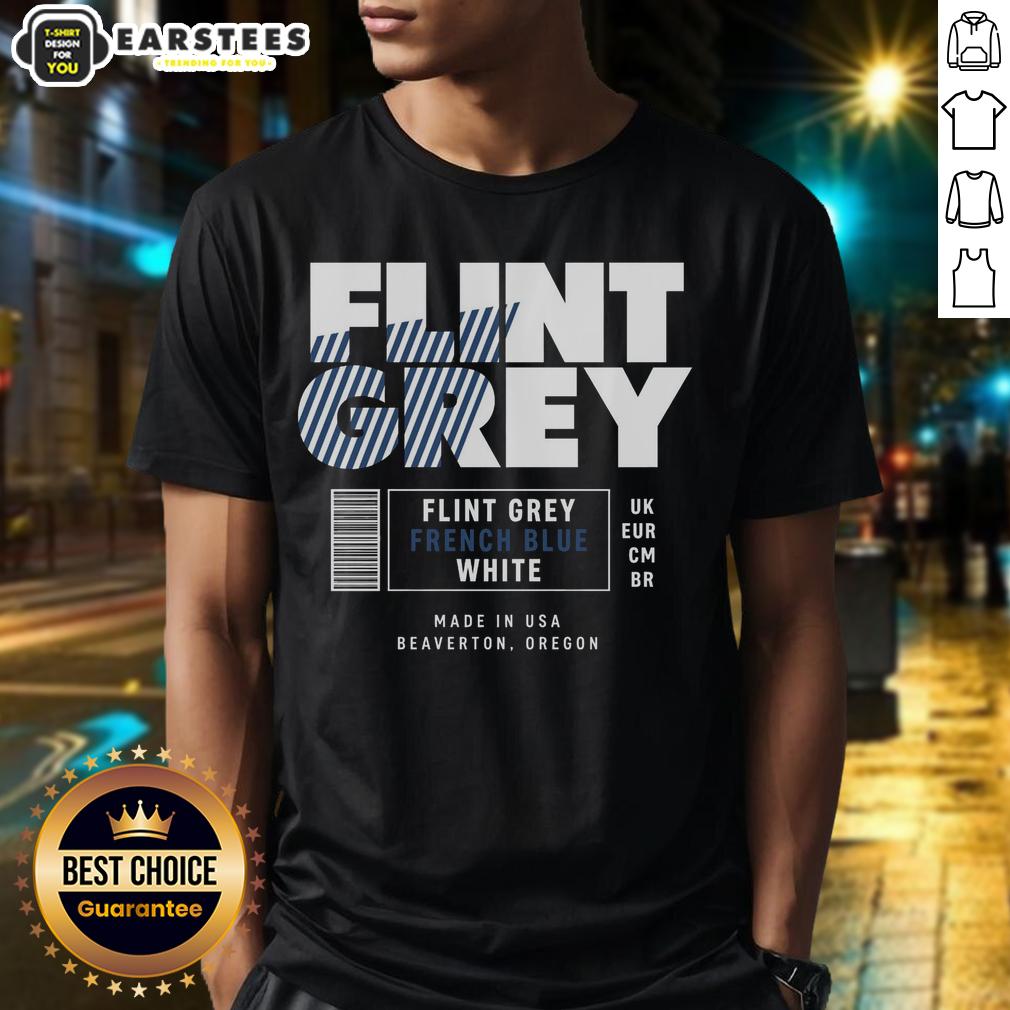 good-flint-grey-french-blue-white-label-t-shirt Good Flint Grey French Blue White Label T-Shirt displayed on a wooden surface, showcasing its stylish design and fabric.