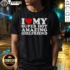 Alt Text: Good I Love My Super Hot Amazing Girlfriend T-Shirt design featuring bold text and vibrant colors for couples.