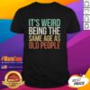 Vintage T-Shirt design: 'Good It's Weird Being The Same Age As Old People' showcasing unique humor and retro style.