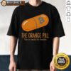 Alt Text: Good The Orange Pill Take As Needed For Freedom T-Shirt featuring bold text design on a vibrant orange tee.