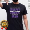 Good Thing Zombies Don't Want My Brain Epilepsy Awareness T-Shirt featuring a humorous design promoting epilepsy awareness.