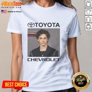Stylish ladies' tee featuring a nice car brand logo, worn by an actor, perfect for car enthusiasts and fashion lovers.