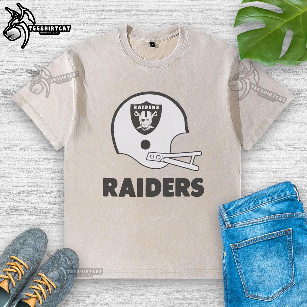 hot-las-vegas-raiders-football-logo-in-big-helmet-washed-t-shirt Alt Text: Hot Las Vegas Raiders football logo on a big helmet design featured on a washed t-shirt for fans.