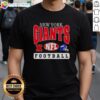 Hot New York Giants NFL football helmet logo T-shirt featuring vibrant team colors and a bold design for fans.