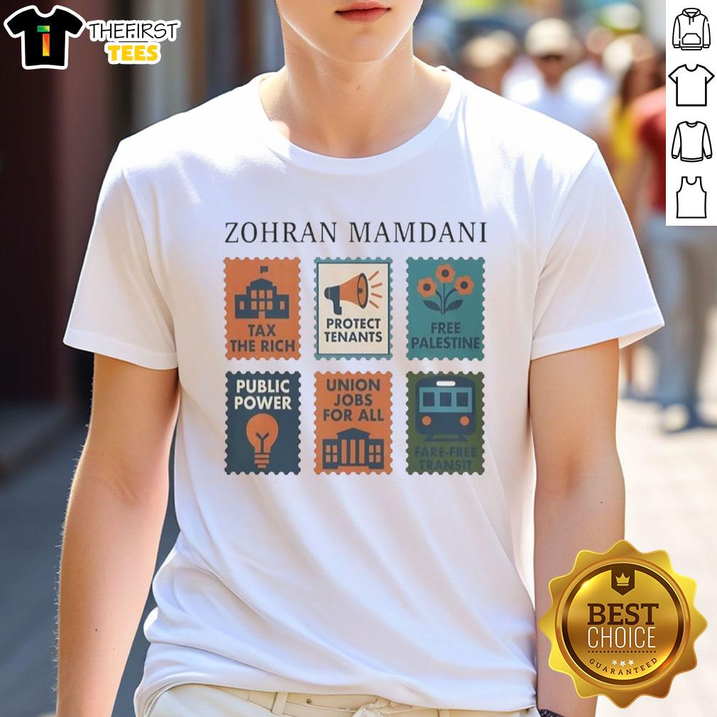hot-zohran-mamdani-tax-the-rich-t-shirt-1 Hot Zohran Mamdani 'Tax The Rich' T-Shirt featuring bold text design and vibrant colors, perfect for statement fashion.