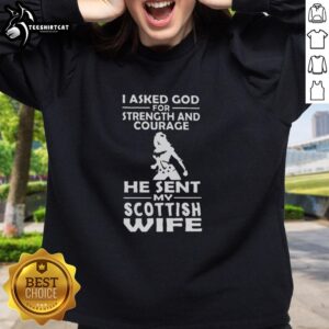 Premium sweatshirt with 'I Asked God For Strength And Courage, He Sent My Scottish Wife' design, perfect for proud husbands.