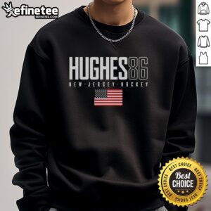 Alt Text: Original Jack Hughes 86 New Jersey Devils USA Flag Elite Sweatshirt featuring vibrant team colors and logo.
