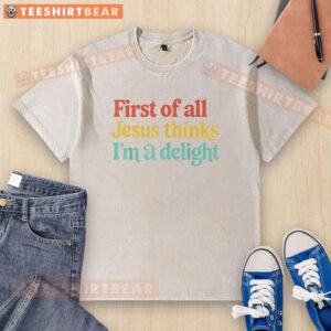 Alt Text: Colorful text reads 'Jesus Thinks I'm a Delight' on a washed t-shirt, perfect for casual and faith-inspired fashion.