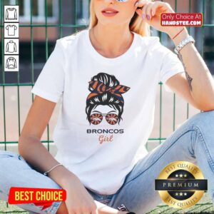 Official Denver Broncos Girl in a messy bun and glasses wearing a stylish ladies tee, perfect for game day.