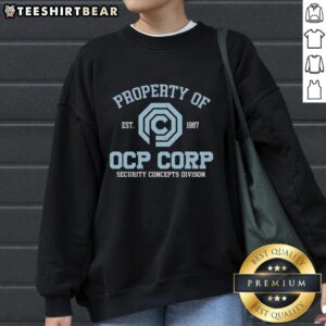 Alt Text: Premium Omni Consumer Products Robocop sweatshirt from OCP Corp Security Concepts Division, est. 1987.
