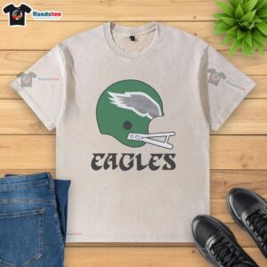 Alt Text: Awesome Philadelphia Eagles football logo on a big helmet washed t-shirt, perfect for fans and casual wear.