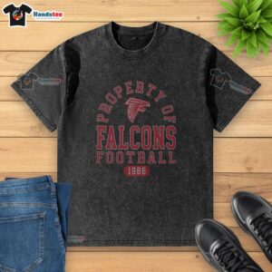 Alt Text: Premium Atlanta Falcons Football Property 1966 Washed T-Shirt featuring vintage design and soft fabric for fans.
