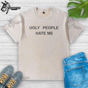 Official Ugly People Hate Me washed t-shirt featuring a humorous slogan in bold letters, perfect for casual wear.