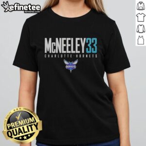 Original Liam McNeeley 33 Charlotte Hornets basketball ladies tee featuring vibrant team colors and stylish design.