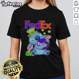 Cute Stitch hugging FedEx logo on a St. Patrick's Day ladies tee, perfect for festive celebrations.