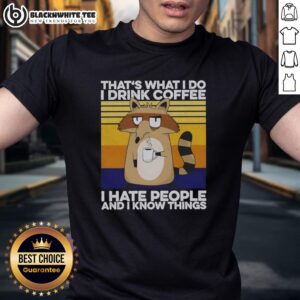 Official Grumpy Raccoon 'That's What I Do I Drink Coffee' T-Shirt featuring a playful raccoon graphic and coffee theme.