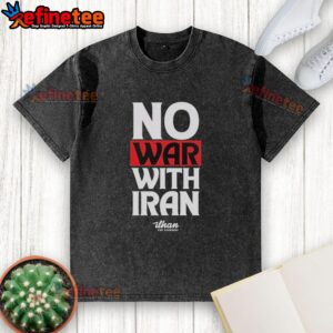 Official No War With Iran washed t-shirt featuring a bold peace message in vibrant colors on a casual style.