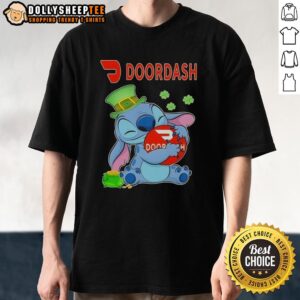 Alt Text: Top Stitch Hug Doordash Logo St. Patrick's Day T-Shirt featuring a festive design and vibrant green colors.