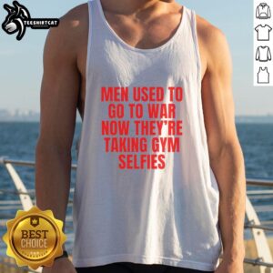 Man in tank top flexing in gym, embodying the phrase 'Good Men Used To Go To War, Now Theyre Taking Gym Selfies.'