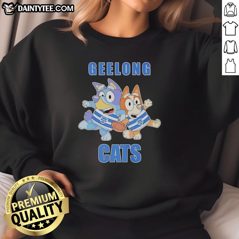 nice-bluey-bingo-geelong-cats-football-fans-rugby-outfits-sweatshirt Fans in Nice Bluey Bingo outfits cheer for Geelong Cats in rugby sweatshirts at a football match.