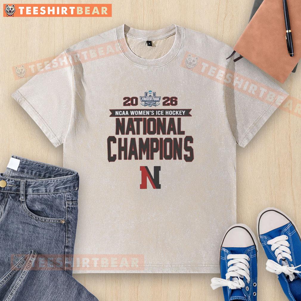 nice-northeastern-huskies-ncaa-womens-ice-hockey-frozen-four-champions-2026-washed-t-shirt-1 2026 NCAA Women's Ice Hockey Frozen Four Champions T-shirt featuring Northeastern Huskies logo and washed design.