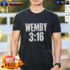 Alt Text: Victor Wembanyama wearing a stylish Wemby 3 16 T-Shirt, showcasing his unique basketball style and personality.