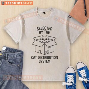 Nice Selected By The Cat Distribution System washed t-shirt featuring a playful cat graphic on a casual style.