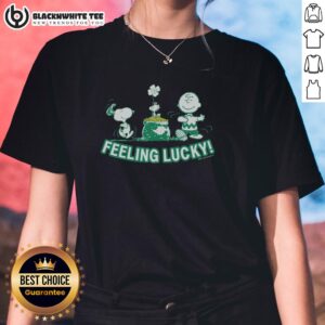 Top Peanuts Snoopy Feeling Lucky ladies tee featuring a playful Snoopy graphic and vibrant colors for casual style.