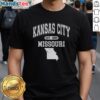 Alt Text: Official Kansas City Missouri Est 1889 Varsity T-Shirt featuring bold lettering and a stylish design in a vibrant color.