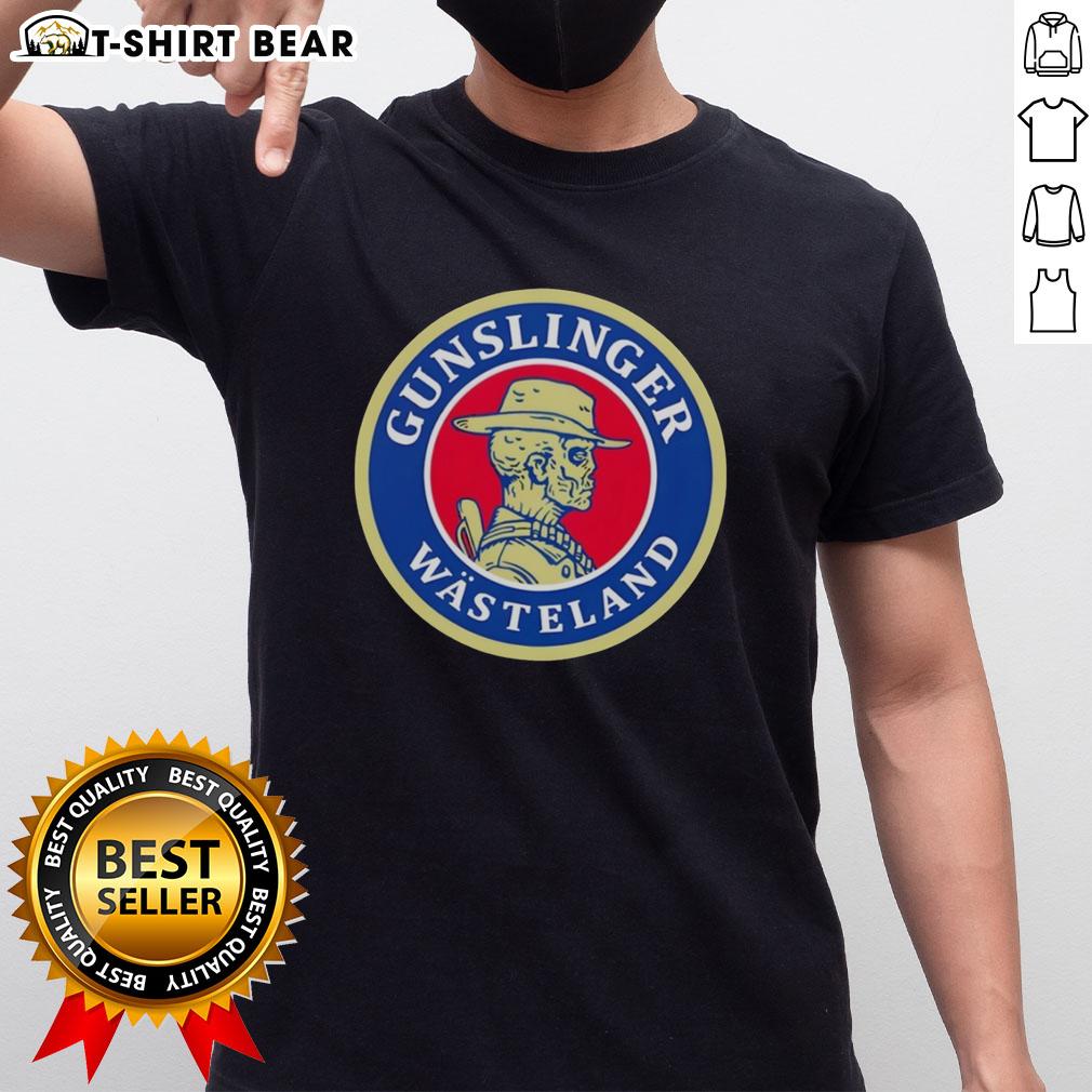 Official Skeleton Cowboy Gunslinger Wasteland Retro T Shirt Official Skeleton Cowboy Gunslinger Wasteland Retro T-Shirt featuring a bold skeleton design with western elements.