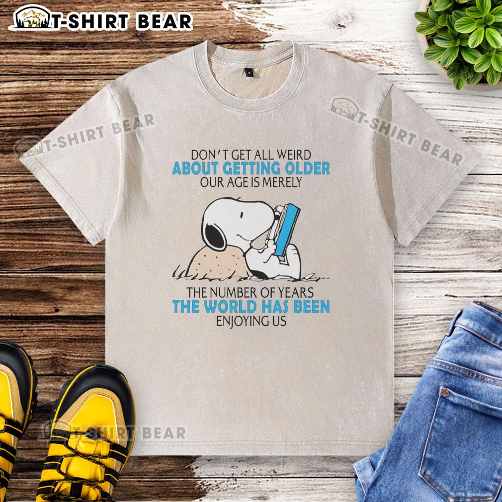 Official Snoopy Don't Get All Weird About Getting Older Our Age Is Merely The Number Of Years Washed T-Shirt Official Snoopy Don't Get All Weird About Getting Older T-shirt featuring a fun age quote on a washed design.