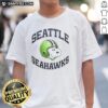 Alt Text: Original Seattle Seahawks Snoopy Freedom 2026 logo T-shirt featuring a vibrant design perfect for fans and collectors.
