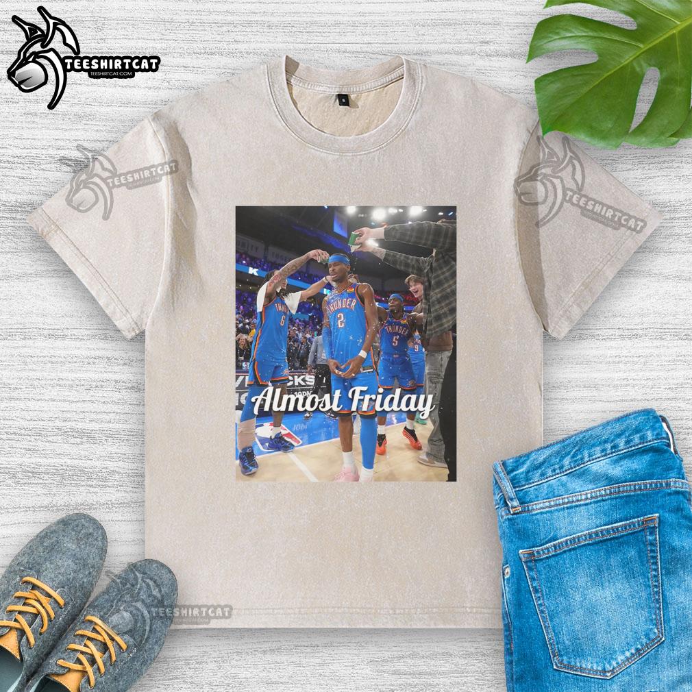 original-shai-gilgeous-alexander-oklahoma-city-thunder-almost-friday-postgame-washed-t-shirt Shai Gilgeous-Alexander in an Oklahoma City Thunder 'Almost Friday' postgame washed t-shirt, showcasing team spirit.