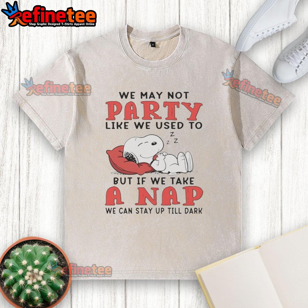 original-snoopy-we-may-not-party-like-we-used-to-but-if-we-take-a-nap-we-can-stay-up-till-dark-washed-t-shirt Alt Text: Original Snoopy We May Not Party Like We Used To t-shirt featuring Snoopy napping, perfect for casual wear.
